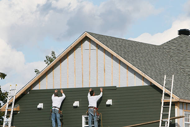 Professional Siding Contractor technician working in Dilliner, PA